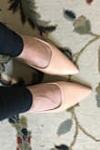 I love these. You can wear them with jeans, stretch pants, skirts, and dresses. So pretty much everything. They're not high so they're easy to walk in but they're still sexy. My foot is a 7 1/2- 8. I got them in an 8 and they do have a little room in the back so I could've gone with the 7 1/2. But to me the size feels fine. I have wide feet and these shoes feels perfect. 

Love em' - Dana S.