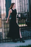 This is the most versatile dress I own - I love it. It is flattering and sexy without being too revealing. The slit is a little high if you have long legs. - Gail B.