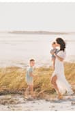 This dress was absolute perfection for our family beach photos. It fits true to size, so comfortable and made me feel beautiful. - Juliana B.