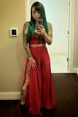 Wore this to a wedding and got a lot of compliments, I'm in love! I'm 5'2", so the pants are way long, even with heels. Will need to get hemmed later..kept stepping on my pants.
Besides that, it fit perfectly since you can adjust the top. I want one in every color. - Chrsitina F.