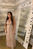 I wore this dress for my brother's wedding this past weekend. I received so many compliments on how everyone loved mine out of all the other bridesmaid dresses. There may be glitter and sequins coming from the dress when you sit but it didn't even matter. I did have to get the sides taken in on the top and the dress cut shorter! - Kaitlyn F.