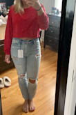 The top is so soft! I've worn it both lounging around the house and out to dinner because it's so comfortable and versatile. The color is just as vibrant as in the photos too. Since it's a dolman top you do have to be careful raising your arms though because the whole shirt will lift up. - Samantha C.