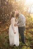 I was hesitant to buy this dress since I was worried it would look a bit like a tent on me, but I took a chance and ordered it for our small covid ceremony in October 2020. It worked out great! Like many other reviews, it was long and I had to hem it 4 inches. I also took in the sleeves and the lace on the back near the waist since I'm a bit short in my chest. I'm 10 months postpartum and nursing. This dress had enough flow and fit in the right places! I couldn't go without a bra, there was not enough support for me with only cups. Maybe if I had experimented more I could've, but I was pinched for time. I paid the extra for quick shipping and it arrived in time!
I would recommend this dress if you're looking for a simple, beautiful dress! I originally wanted the rose color but it was out of stock. The white turned out beautifully, though. I look forward to trying this in other colors. - Jeri H.