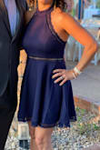 Loved the cut and fit of this dress. It showed off my shoulders and was very comfortable to wear for this outdoor wedding. - Deanna M.