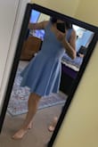I love this cute short dress. The material is nice and thick and tight. It is tight but very comfy at the same time. The bottom part of the dress pops out like a skirt and it's super flattering. - Jannell B.