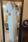 I ordered this as my second dress for my NYE wedding and I'm blown away! It does have stretch to it and zip in the back so it's very comfortable. I was surprised at how thick the dress was. I won't have to worry about staying warm (that was the point of a second dress). I can't wait to wear this on my wedding day! Don't hesitate on buying this dress. - Torie R.