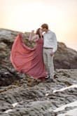 It was definitely quite long but that was fine for engagement shots. If I wanted to wear it to an event I would likely get it tailored. We ended up going into the water in our shoot and it easily cleaned up. - Jessica B.