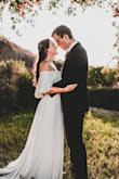 I got this for my small back yard wedding, and it was absolutely perfect! I had to get it hemmed a little in the front because it comes really long, and I'm pretty short. But once I did, it was like it had a subtle train. It was perfect! - Maddie L.