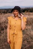 Not see through at all. I tied the belt in the front because it was more flattering to my belly area. Great fall color! - Ashley P.