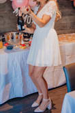I love this dress it fit me perfectly and I am 5'9 and I always worry about the length on shorter dresses but it falls at a very reasonable length! I wore it to my bridal shower and it was perfect for photos!!! - Lisa B.