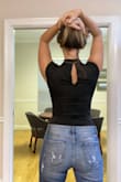 Amazing. Will look great with pretty much anything (jeans, skirt, nice pants, etc.) Wanted to get this in white also but was out of stock. Very Flattering. 

Fabric is slightly thinner than I was expecting but has just the right amount of stretch. There are clasps in the bottom. Pretty comfortable as far as bodysuits go. If you need an everyday basic get this asap! - Christen A.