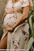 This dress was a dream for maternity pictures. The color does look different due to photographer editing, but was great to have a dress that I could wear while pregnant and after due to it's versatility. Wrap dress for the win! - Krysta B.