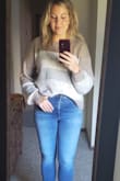 Love this sweater. Got a medium and it is the perfect fit and is a little loose fitting which I love. - Aileen L.