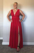 This dress does have a fitted zipper around the rib cage but flexibility in the bust and lower belly. It drapes really nicely. Doesn't over expose the leg like I was worried about because there is plenty of fabric. - Kayla H.