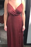 The material was more silky-like. I guess I thought it would be more velvety. But I still loved it!! It was a perfect dress for my aunt's fall wedding. - Taitum D.