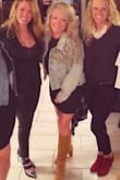 I absolutely love these boots. I've worn them twice so far with two different style black dresses. They will go with any color. Highly recommended. Tip- wear knee highs under your boots instead of socks. It helps with structure and not too thick. - Taunia M.