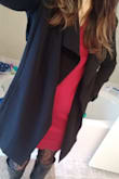 This jacket is so beautiful! I am so in love! I live in southern Texas so it's doesn't get very cold so this jacket is perfect. Forgive the awkward picture lol it's the only one I've taken of the item. It has great length, sits just a bit above the knee. It's too tight in the shoulders or armpits. There are shoulder pads in the jacket. Seriously ladies purchase this jacket! Wish it had more colors to choose from. - Crystal C.