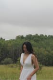 First of all, I received a wrong colour so they sent me a new one with no extra charge. Their response was prompt and the customer service was great. The associates that I talked to were very nice. Because of Covid we couldn't have a big wedding so I ordered this dress for our little legality signing ceremony. This was my first time ordering from Lulus and I love this dress. I am a little picky about materials, but this dress is high quality and I love the was it flows! The slid on the side is super cute too. :)) - Rene K.