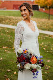I purchased this as a last minute option for my elopement/ courthouse wedding and it worked out perfectly! I did have to hem the bottom about 4 inches as it does run super long but it turned out so gorgeous in pictures. The back is beautiful as well. - Navpreet S.