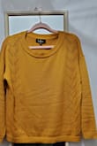 The color of this sweater is such a beautiful golden mustard! I am usually between a small and medium. The medium I bought is a little big, but I don't mind that because I prefer sweaters to fit a bit loose. I also love the pointelle details!
(Please excuse the wrinkles. I didn't fold the sweater before taking the pics) - Laura D.