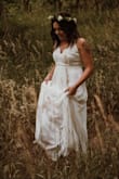 I bought several dresses for a small wedding and kept this one. It is a little long, but nothing a quick alteration couldn't fix. I loved this dress! - ASHLEY G.