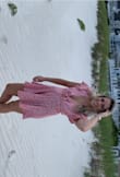 I love this!!! It is so flattering and is sexy without being inappropriate. The flow of the skirt bottom is so fun. I highly recommend! I'm an athletic 140 and the waist is not stretchy but maybe could have gone a size down but the waist would have been uncomfortably tight. - Danielle B.