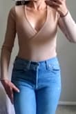 Really good material. I am usually an XS and the XS fits perfect. The fabric is thick so you don't have to wear a bra. I recommend it. - CLARISSA M.