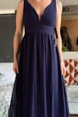 If you're debating on getting this dress just do it. I feel like it would flatter most women's bodies because of the way it is constructed. The band that sits under your chest is perfectly placed that it holds your chest up (no bra needed) and the little wires in the chest area also do a great job of flattering your chest. The placement of the band is also in a perfect spot that the bottom of the dress flows from it hiding any tummy imperfections. It is very long, so it will likely need to be hemmed if you're not super tall. I put it on with 4" heels and still need to hem it. - Tracey Z.