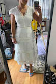 I loved this dress! I just went with a different style but it fit perfectly. I always size down from a medium to a small in Lulus dresses, mostly because of length, and this was no different! The small fit snug and beautifully. - Kelly B.