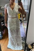 This set is beautiful and so unique, but my one complaint is the skirt is short compared to the long lace overlay and the lace overlay has the cutest embroidery that you wouldn't want to hem off! It just was too long on me so I went with another option. Perfect for someone taller though! - Kelly B.