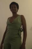 I have a small bust and waist, but am hippy with bigger thighs. I was worried that the jumpsuit wouldn't fit my hips, but I like the fit and flare of the pant legs on me. The top also fits me well. I like the color, style. Overall, it's flattering to my figure. - Roxanne T.