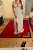 I bought this dress for my wedding and absolutely love it! I'm usually between a small and medium but I opted for the small since that was the only size in stock. It fits great but any tighter and I wouldn't be able to zip it up. Love it overall! The first pic is before I shortened the straps - Quin H.