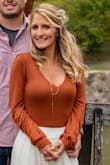 I wore this top with an Ivory skirt as my wedding dress and it couldn't have been more perfect!  It was comfortable and fit true to size. - Molli B.