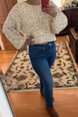 This sweater is like butter. It's SO soft and cuddly and perfect for cold weather. It can be worn in different ways which I love. I ordered a M/L and it is a little big. I would've returned for a smaller size but they were out of stock. Although its a little big I am still so in love with it!! - Dana S.