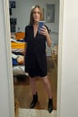 I originally ordered a small, but due to the fact that it isn't a fitted dress to begin with, the small just looked a little tent-like on me, so I returned it and ordered an XS, which is still a loose fit, as it is meant to be, but definitely not as bad as the small, so I would recommend ordering down a size. - Pauline H.