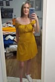 I love this dress. I originally ordered this in a small, but due to the stretchy, billowy nature of the top, it looked a little too big around the chest area, so I returned it and ordered an XS, and because it is sort of A-lined, the smaller size didn't affect the way it fit me on the bottom, but it is a little snug around the mid section, but nothing too bad.. - Pauline H.