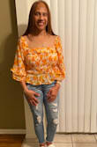 Very sexy and flattering top! This is true to size if you would like it to hug your body as it was intended. I can wear it with pants and skirts, dress it up or down. It's form fitted and extremely soft, and comfortable. - Jannie M.