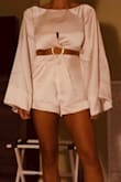 Cannot wait to wear this romper for my 3rd wedding anniversary!! Fit runs a little small...would have maybe liked a size up but it works and looks great! Super quality look, feel, and construction. - Amber C.