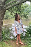 This dress is stunning!! I've never received so many compliments on an article of clothing! I love the wrap to give it a custom fit. Beautiful quality. Highly recommend. - Melissa L.