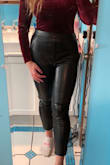 I usually go between a medium and large in pants and went with a M.  They fit tighter on me than they look on the model but I love them! I have more athletic legs but I think for most people you could get your normal size for a trouser-like fit and maybe a size down for more of a tighter pant.  The black is not as shiny as it appears on the model either.  I love the soft, thin lining that is very comfortable and perfect for cooler weather.  Great quality and super flattering fit!  Definitely recommend! - Alexandria D.