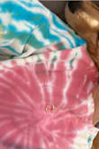 Cute crop look but not super short. Very comfortable material. Colors were pretty bright- not exactly like the photo but hey, that's the beauty of tie-dye. I love it! Might buy in a different color now - Gianna P.