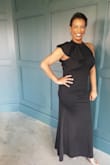This dress is absolutely beautiful. I ordered an extra-large. I have broad shoulders and I am a bit busty. This dress hugs every curve. For my busty gals,  I was able to wear a regular strapless bra without any issues. The cut of this dress compliments the waist line as well as the shoulders. Minimal jewelry is needed. 

I was able to iron out any wrinkles with low heat. There is lining inside to help smooth out any unwanted bumps. Simple, elegant, and classic! Many compliments received!!! - Karla S.