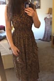 Great length and stretchy material. A very Sophisticated dress with charming ruffles. A must buy. - Kendra T.