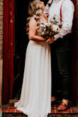 Got this dress to elope and it was PERFECT! I have a pretty wide back and it was just what I needed! I recommend getting double sided Hollywood tape so the girls don't make an appearance! I did and it was perfect! - Monica A.