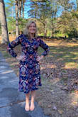 This dress was exactly what I hoped it would be. Fitted through the waist and chest, but flowing everywhere else so I still felt like I had a shape. The keyhole in back is a nice touch. The colors and print were beautiful. - Katherine H.