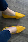 The length of this shoe is fine but the width is too tight for wide feet. I'm using shoe stretchers to try to loosen them up a bit so hopefully that helps but if not, I'll use them on days that I don't have to walk very much. The flats go great with jeans and simple dresses. Got them in two colors! - Amanda G.