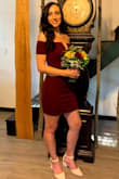 This dress fits amazing! I normally have issues with dresses not covering my behind but this one did the trick. I wore it at a wedding I was in and it was perfect. The only thing is the hanger straps kept showing but I chose to not cut them off. Also, my bra showed a few times but nothing major. Very flattering! - Catnerine B.