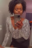 I got this body suit along with skirt and it was a home run, it hugged my body and fit like a soft glove, the cut is just low enough and doesn't have a girl handing out. - Ciany V.