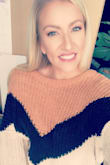 I am completely in love with this and have been complimented every time I've worn it. The color blocking is cute without being too busy, the fabric is soft and medium weight is warm, without being too heavy! I've worn with black yoga pants for working from home but it would totally work with leather leggings, or jeans! I sized up from my normal M, because I wanted it baggier and also not too short. It's on the boxy side. Highly recommend! - Carrie S.