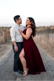 Purchased this dress for my engagement photos! It was exactly what I had pictured except the color. The color wasn't a deep red and was more of a deep purple. Luckily my photography was able to change the color for me so don't let this photo fool you! Overall I loved it! - Carly C.